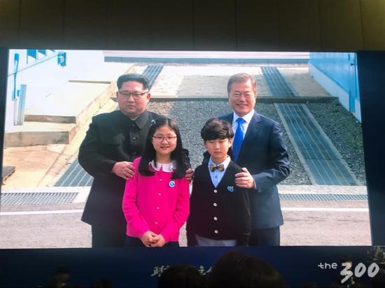 金正恩与花童合影后 这个烫发的小男孩火了